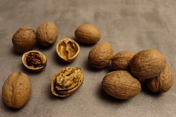 Walnuts on old brown wooden table