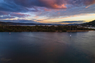 Sunrise waterscape and reflections with clouds