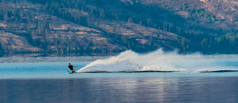 Rear view of a waterskier on a lake, Canada