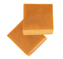 Caramel candies isolated on white background. Caramel fudge top view