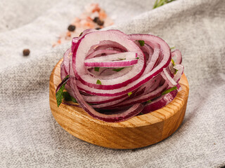 Sliced red onion rings in the bowl