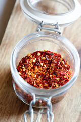 dried chilli flakes in a glass jar