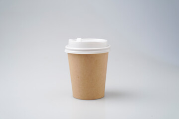 Front view of empty a cup of coffee craft paper disposable mock up on white background. Delivery food concept.