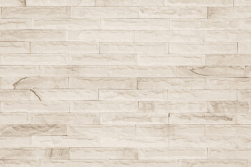 Cream and white brick wall texture background. Brickwork and stonework flooring interior rock old pattern design