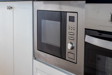modern oven built in white kitchen furniture