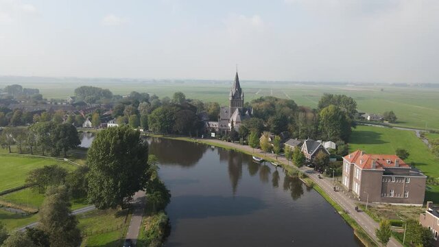 Aerial view of Amstelveen Oudekerk ad Amstel typical dutch landscape and historic village along the Amstel river in The Netherlands.