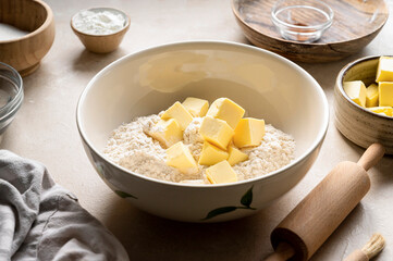 Baking pastry concept - mixing dough from butter and flour. Cooking a desset, pie or cookies. Step by step recipe.