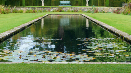 Fototapeta na wymiar beautiful Pin Mill pond in the grade I listed gardens at Bodnant Gardens, Colwyn Bay, Wales UK