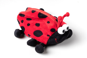Soft toy ladybug. Isolated on white background. Close up.