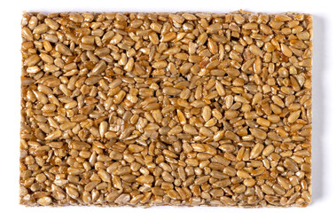 Rectangular tile of sunflower kozinak. Isolated on white background. Close-up. Top view.