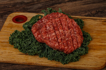 Raw beef burger cutlet for cooking