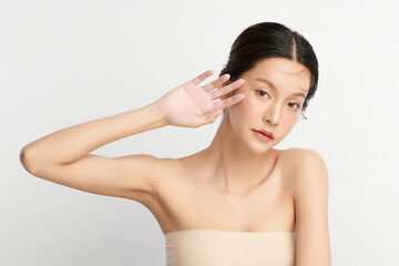 Naklejka premium Beautiful young asian woman with clean fresh skin on white background, Face care, Facial treatment, Cosmetology, beauty and spa, Asian women portrait.