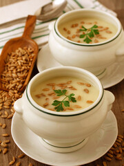 Zucchini soup with sunflower seeds.