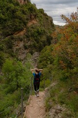 Girl picking her hair up in nature