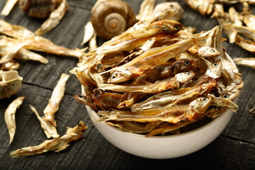 Fototapeta na wymiar Bowl of sun dried anchovy fish. tropical coastal foods,