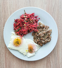 Soft-boiled eggs, buckwheat with green lentils and vegetable salad