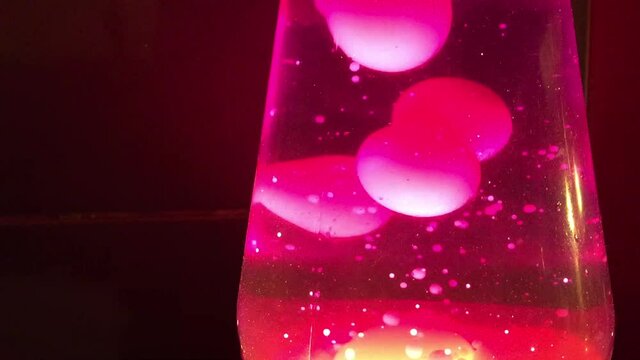 pink  Lava lamp closeup 70s style pink lava liquid background stock footage with copy space