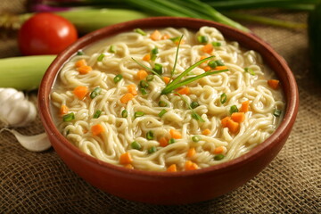 Homemade traditional  vegan diet noodles soup. healthy vegetarian breakfast meal.