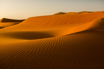 Beautiful sand dunes in the Sahara Desert in Morocco. Landscape in Africa in desert.