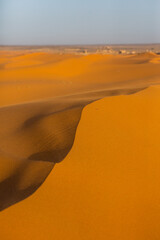 Beautiful sand dunes in the Sahara Desert in Morocco. Landscape in Africa in desert.