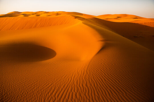 Beautiful sand dunes in the Sahara Desert in Morocco. Landscape in Africa in desert. © romeof