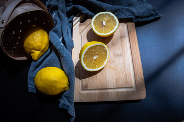 sliced lemons on cut board flat lay