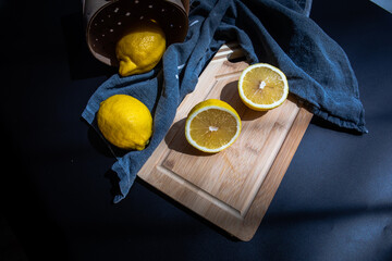 sliced lemons on cut board flat lay