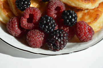 pancakes with fresh berries. breakfast food. dessert.
