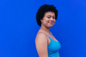 Side View Portrait Of A Young Afro Woman