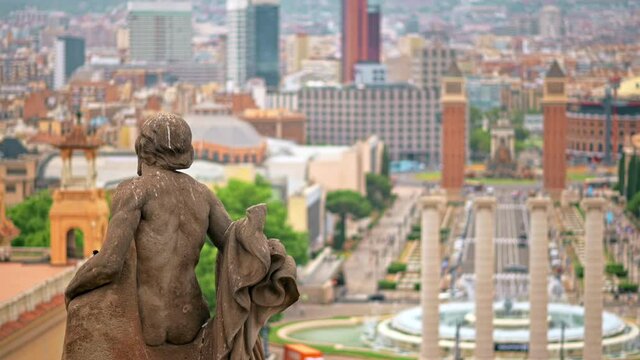 The National Palace statue with view of Barcelona on the background, Spain. Cloudy weather