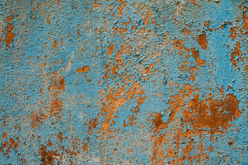 Rusty metal turquoise and red color texture background. Oxidated metal surface. Old vintage painted steel plate