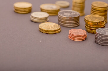 Coins Money US dollars and Euros on a gray background, different monetary coins