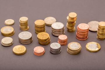 Coins Money US dollars and Euros on a gray background, different monetary coins