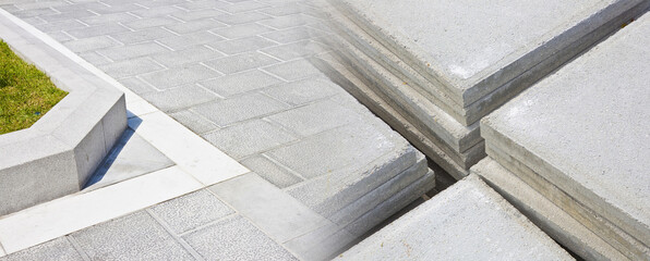 New paving made with stone or concrete blocks with concrete slabs in a construction site for...