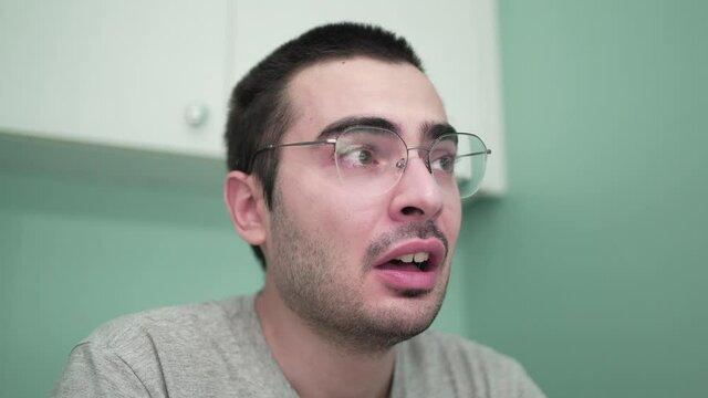 Man with Constipation Problems Sitting on a Toilet Trying to Push