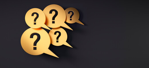 Five golden speech bubbles with question marks in front of a black wall	

