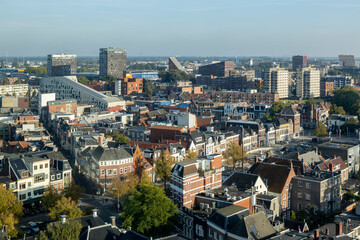Fototapeta na wymiar Skyline cityscape with rooftops of city center Groningen in The Netherlands seen from the Forum cultural building