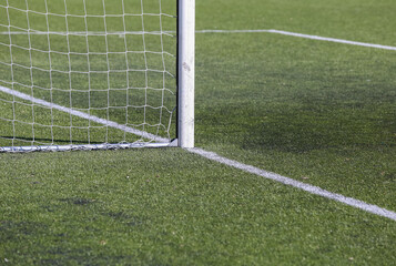 white marking strip on a soccer field with