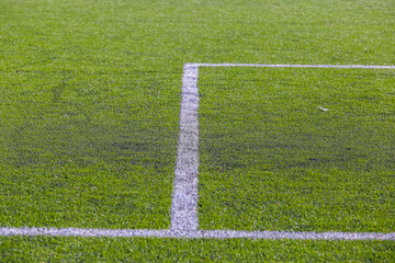 white marking strip on a football field