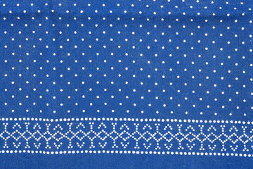 close up of a piece of fabric printed in blue dyeing process