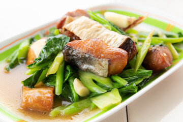 Fried mackerel fish with garlic,