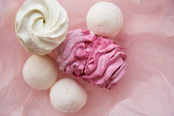 Winter aesthetic. Healthy natural delicate pink and white marshmallow close up. Top view. Cozy winter weekends. Homemade sweets
