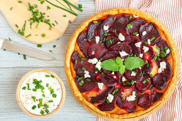 Homemade beetroot tart sprinkled with feta cheese