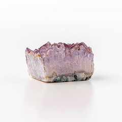 Amethyst semiprecious purple quartz gemstone side view. Raw stone isolated on white background