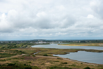 Fototapeta na wymiar View of Christchurch Priory and the River Stour from Hengistbury Head Dorset England