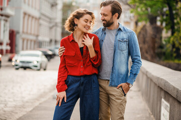 man and woman on romantic vacation walking together