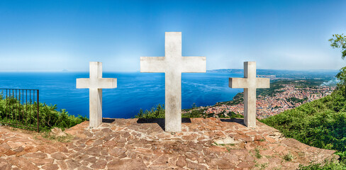 Three crosses on the top of Mount Sant'Elia, Palmi, Italy