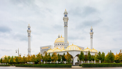 Fototapeta na wymiar The White mosque in city of Shali Chechen republic. The Pride of Chechnya - the largest mosque in Europe. The mosque is built of white marble imported from Greece