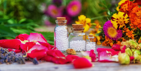 Bottled herbal and flower tinctures. Selective focus.