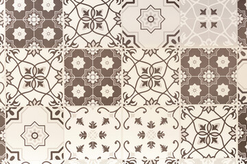 Ceramic coating for walls with textured patterns.